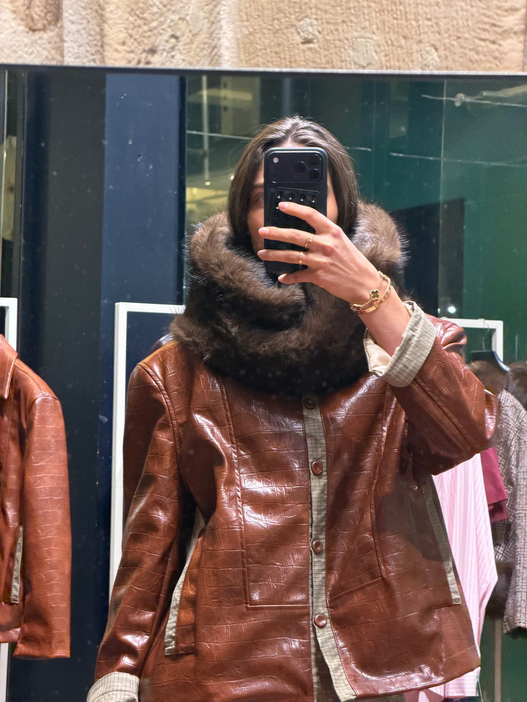 The faux leather collar